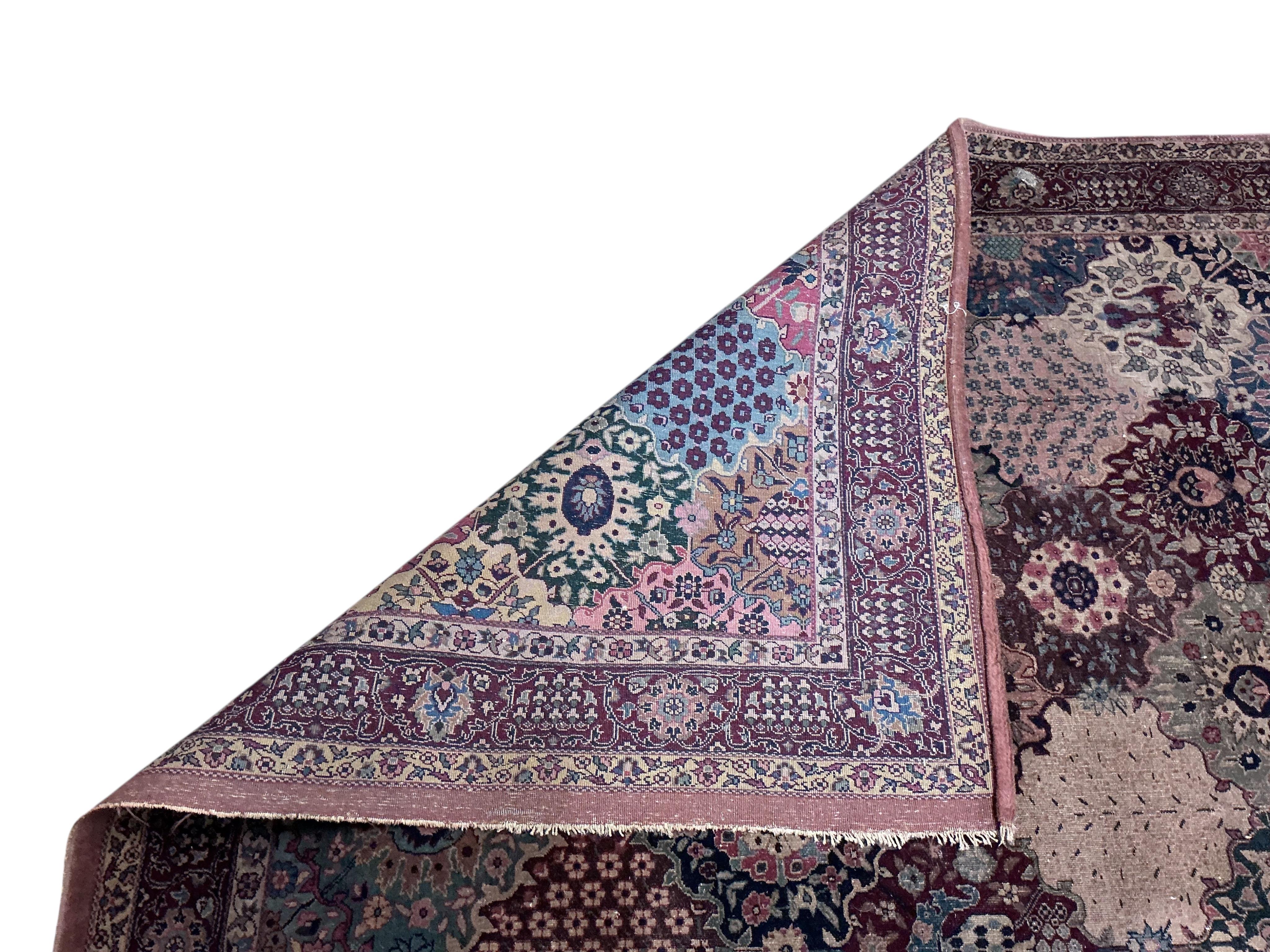 A North West Persian floral rug, 250 x 136cm